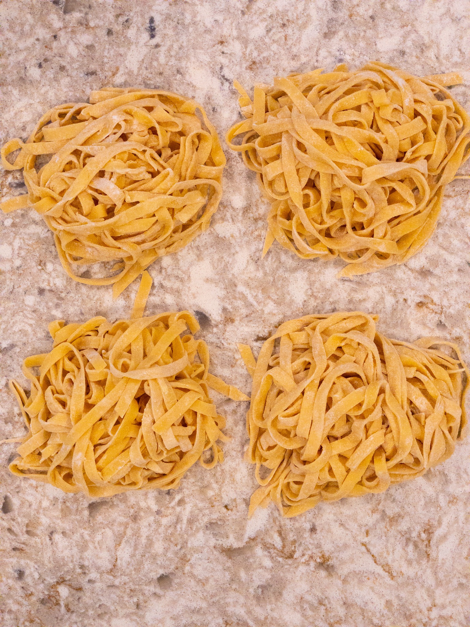 nests of fresh pasta noodles